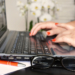 person-woman-desk-laptop