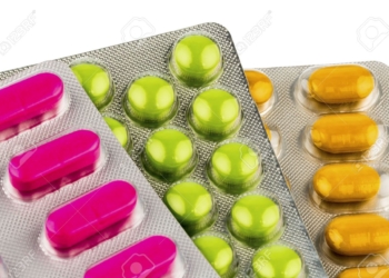 18031329-pastillas-de-colores-en-envases-tipo-blister-icono-de-la-foto-para-la-medicina-y-la-asistencia-sanit-Foto-de-archivo.jpg